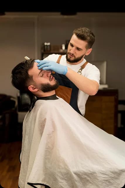 Barber working